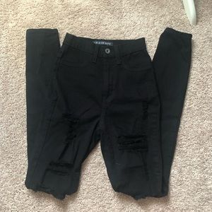High waisted black ripped skinny jeans